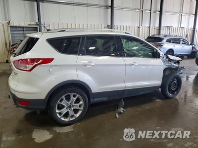 Trzecie zdjęcie samochodu z tyłu: 2016 FORD ESCAPE TITANIUM VIN:1FMCU9J98GUA39419 - miniatura