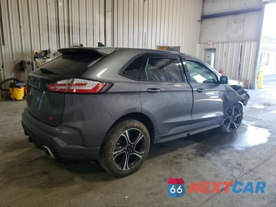 Trzecie zdjęcie samochodu z tyłu: 2023 FORD EDGE ST VIN:2FMPK4AP1PBA45173 - miniatura