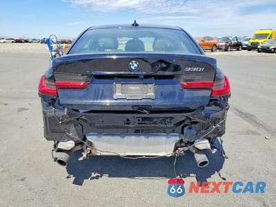 Zdjęcie 6 z 13 samochodu: 2022 BMW 330I VIN:3MW5R1J04N8C43434 - miniatura
