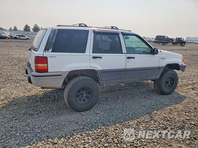 Trzecie zdjęcie samochodu z tyłu: 1995 JEEP GRAND CHEROKEE LAREDO VIN:1J4GZ58S9SC719038 - miniatura