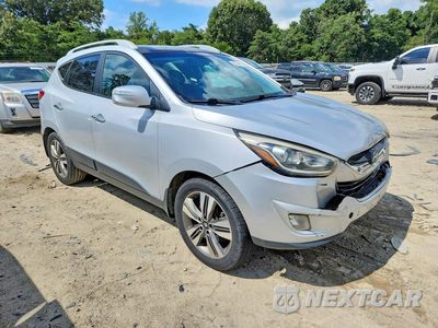 Czwarte zdjęcie samochodu z boku: 2014 HYUNDAI TUCSON LIMITED VIN:KM8JUCAG1EU945783 - miniatura