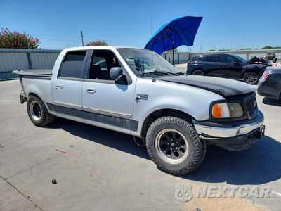 Czwarte zdjęcie samochodu z boku: 2002 FORD F150 SUPERCREW VIN:1FTRW07602KB56692 - miniatura