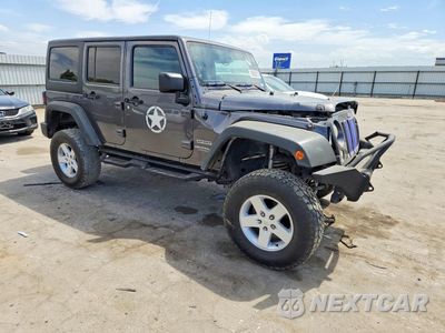 Czwarte zdjęcie samochodu z boku: 2014 JEEP WRANGLER UNLIMITED SPORT VIN:1C4HJWDG7EL246866 - miniatura