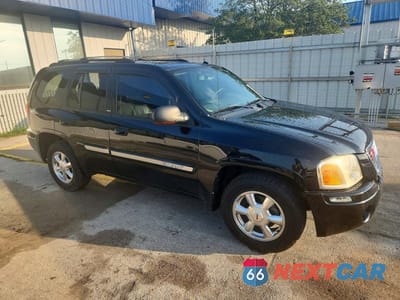 Czwarte zdjęcie samochodu z boku: 2004 GMC ENVOY VIN:1GKDT13S642342398 - miniatura