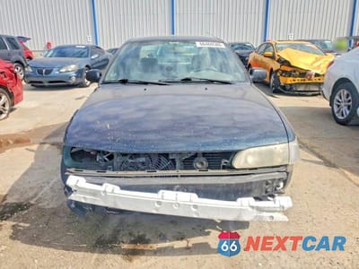 Piąte zdjęcie samochodu w środku: 1997 TOYOTA COROLLA BASE VIN:2T1BA02E2VC171702 - miniatura