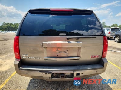 Zdjęcie 6 z 13 samochodu: 2007 GMC YUKON XL C1500 VIN:1GKFC16027R267987 - miniatura