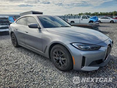 Czwarte zdjęcie samochodu z boku: 2024 BMW I4 EDRIVE 35 VIN:WBY43AW09RFT34171 - miniatura