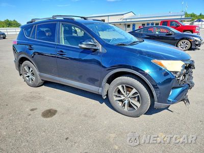 Czwarte zdjęcie samochodu z boku: 2018 TOYOTA RAV4 XLE VIN:JTMRFREV0JJ731277 - miniatura