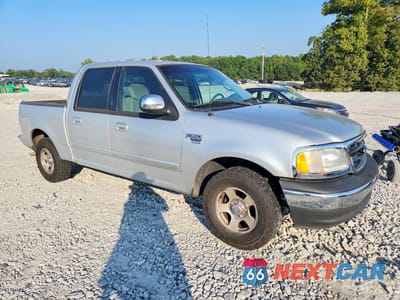 Czwarte zdjęcie samochodu z boku: 2001 FORD F150 SUPERCREW VIN:1FTRW07L31KA40780 - miniatura