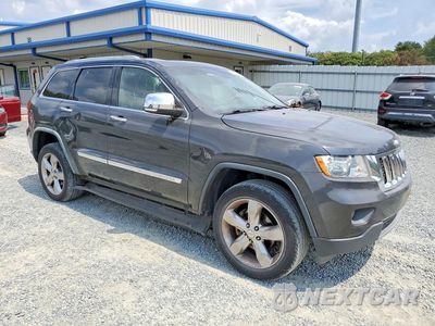 Czwarte zdjęcie samochodu z boku: 2011 JEEP GRAND CHEROKEE OVERLAND VIN:1J4RR6GG3BC607556 - miniatura