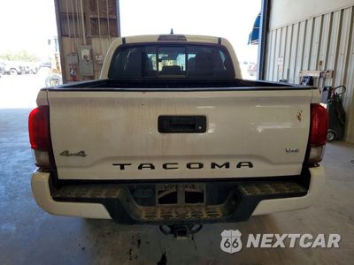 Zdjęcie 6 z 12 samochodu: 2019 TOYOTA TACOMA SR V6 VIN:5TFCZ5AN5KX173324 - miniatura