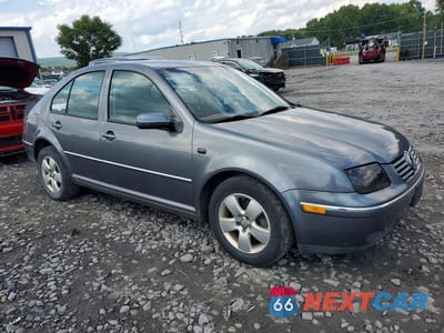 Czwarte zdjęcie samochodu z boku: 2005 VOLKSWAGEN JETTA GLS VIN:3VWSK69M55M028437 - miniatura