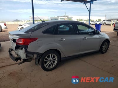 Trzecie zdjęcie samochodu z tyłu: 2016 FORD FOCUS SEL VIN:1FADP3F27GL254407 - miniatura
