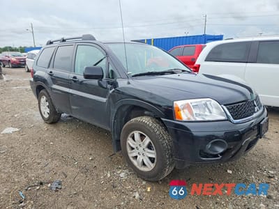 Czwarte zdjęcie samochodu z boku: 2011 MITSUBISHI ENDEAVOR LS VIN:4A4JN2AS5BE027307 - miniatura