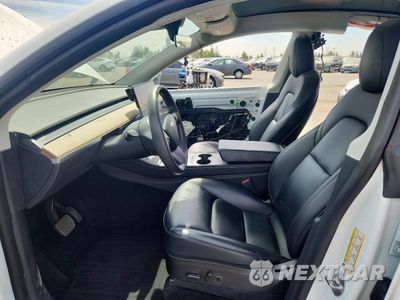 Zdjęcie 7 z 14 samochodu: 2022 TESLA MODEL Y VIN:7SAYGAEE7NF429723 - miniatura