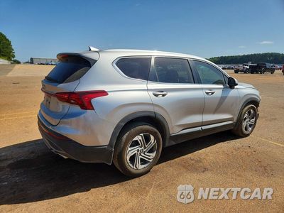 Trzecie zdjęcie samochodu z tyłu: 2021 HYUNDAI SANTA FE SE VIN:5NMS14AJ2MH359084 - miniatura