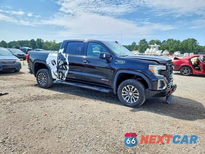 Czwarte zdjęcie samochodu z boku: 2021 GMC SIERRA K1500 AT4 VIN:3GTP9EED2MG352351 - miniatura