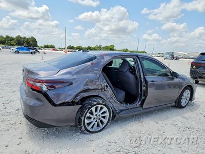 Trzecie zdjęcie samochodu z tyłu: 2024 TOYOTA CAMRY LE VIN:4T1C11AK3RU256716 - miniatura