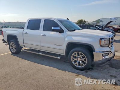 Czwarte zdjęcie samochodu z boku: 2018 GMC SIERRA C1500 SLT VIN:3GTP1NECXJG259734 - miniatura