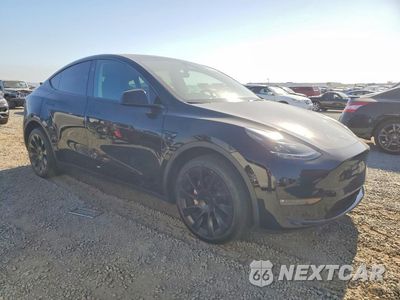 Czwarte zdjęcie samochodu z boku: 2023 TESLA MODEL Y VIN:7SAYGDEE1PF835873 - miniatura