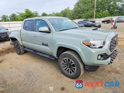 Czwarte zdjęcie samochodu z boku: 2023 TOYOTA TACOMA TRD SPORT VIN:3TMCZ5AN0PM558481 - miniatura