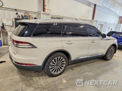 Trzecie zdjęcie samochodu z tyłu: 2024 LINCOLN AVIATOR RESERVE VIN:5LM5J7XC7RGL06072 - miniatura