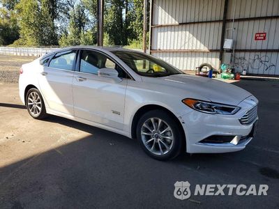 Czwarte zdjęcie samochodu z boku: 2018 FORD FUSION SE PHEV VIN:3FA6P0PUXJR260900 - miniatura