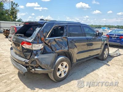 Czwarte zdjęcie samochodu z boku: 2015 JEEP GRAND CHEROKEE LAREDO VIN:1C4RJFAG3FC205161 - miniatura