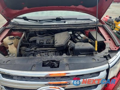 Zdjęcie 12 z 13 samochodu: 2012 FORD EDGE SEL VIN:2FMDK3JC0CBA88195 - miniatura