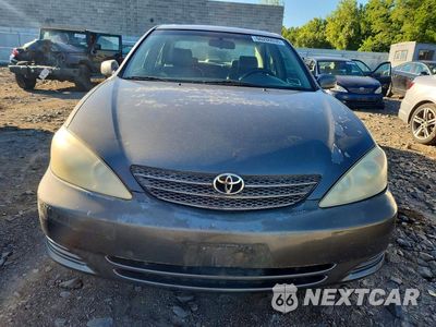 Piąte zdjęcie samochodu w środku: 2003 TOYOTA CAMRY LE V6 VIN:4T1BF32K53U547197 - miniatura