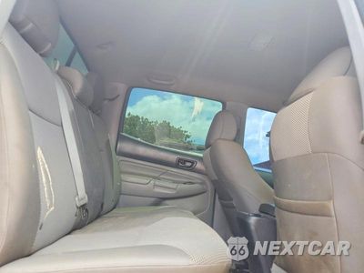 Zdjęcie 10 z 13 samochodu: 2014 TOYOTA TACOMA V6 VIN:3TMLU4EN8EM155428 - miniatura