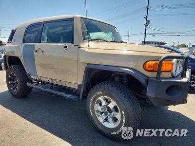 Czwarte zdjęcie samochodu z boku: 2011 TOYOTA FJ CRUISER BASE VIN:JTEZU4BF5BK011292 - miniatura