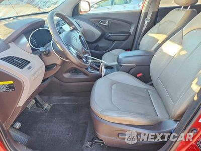 Zdjęcie 7 z 12 samochodu: 2014 HYUNDAI TUCSON LIMITED VIN:KM8JUCAG3EU798298 - miniatura