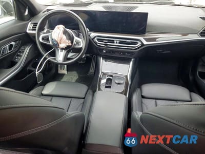 Zdjęcie 8 z 12 samochodu: 2023 BMW 3ER 330E VIN:3MW39FF04P8D57207 - miniatura