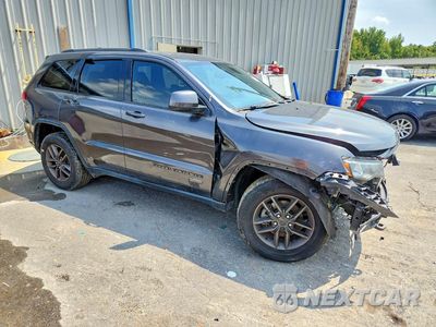 Czwarte zdjęcie samochodu z boku: 2016 JEEP GRAND CHEROKEE LAREDO VIN:1C4RJEAG4GC369336 - miniatura