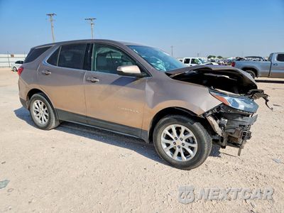 Czwarte zdjęcie samochodu z boku: 2019 CHEVROLET EQUINOX LT VIN:2GNAXKEV2K6142030 - miniatura