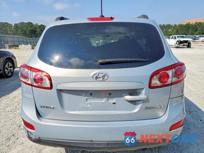 Zdjęcie 6 z 13 samochodu: 2010 HYUNDAI SANTA FE GLS VIN:5NMSG3AB2AH404196 - miniatura