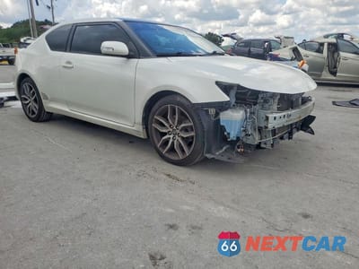 Czwarte zdjęcie samochodu z boku: 2016 SCION TC BASE VIN:JTKJF5C72GJ017355 - miniatura