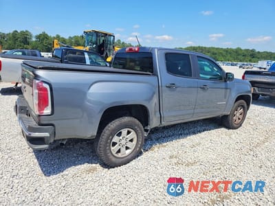 Trzecie zdjęcie samochodu z tyłu: 2020 GMC CANYON VIN:1GTG5BEA8L1105414 - miniatura