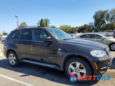 Czwarte zdjęcie samochodu z boku: 2012 BMW X5 XDRIVE35D VIN:5UXZW0C50CL668184 - miniatura