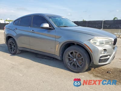 Czwarte zdjęcie samochodu z boku: 2016 BMW X6 SDRIVE35I VIN:5UXKU0C52G0F92954 - miniatura