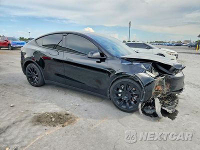 Czwarte zdjęcie samochodu z boku: 2023 TESLA MODEL Y VIN:7SAYGDEE4PA104562 - miniatura
