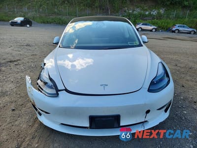 Piąte zdjęcie samochodu w środku: 2022 TESLA MODEL 3 VIN:5YJ3E1EB5NF249997 - miniatura