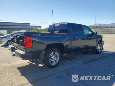 Trzecie zdjęcie samochodu z tyłu: 2017 CHEVROLET SILVERADO K1500 LT VIN:3GCUKREC5HG338438 - miniatura