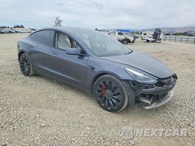 Czwarte zdjęcie samochodu z boku: 2022 TESLA MODEL 3 VIN:5YJ3E1EC9NF312138 - miniatura