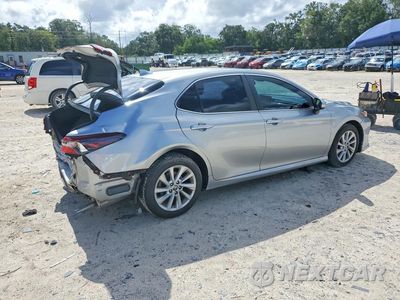 Trzecie zdjęcie samochodu z tyłu: 2021 TOYOTA CAMRY LE VIN:4T1C11AK9MU455116 - miniatura