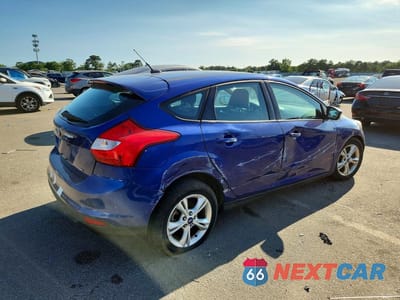 Trzecie zdjęcie samochodu z tyłu: 2012 FORD FOCUS SE VIN:1FAHP3K21CL351782 - miniatura