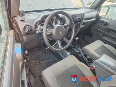 Zdjęcie 8 z 12 samochodu: 2010 JEEP WRANGLER SPORT VIN:1J4AA2D13AL146323 - miniatura