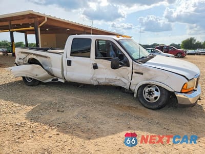 Czwarte zdjęcie samochodu z boku: 2000 FORD F350 SUPER DUTY VIN:1FTWW32F6YED69312 - miniatura