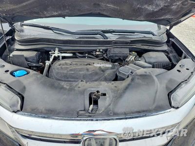Zdjęcie 12 z 13 samochodu: 2020 HONDA PILOT TOURING VIN:5FNYF6H94LB008874 - miniatura